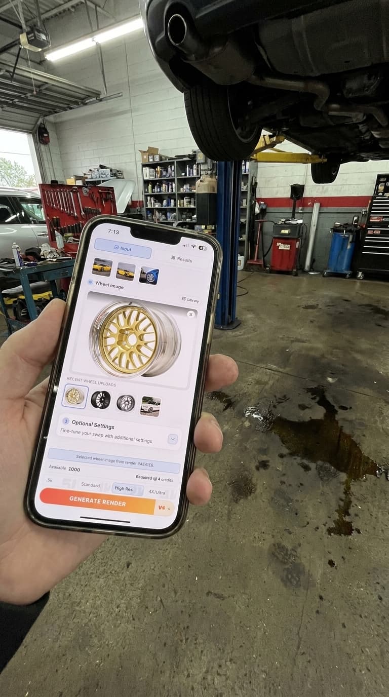 Shop owner holding iPhone displaying WheelBlend visualizer