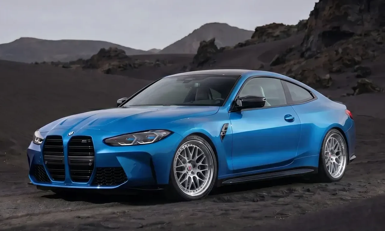 Blue BMW M4 coupe with bright multi-spoke performance wheels on black volcanic sand
